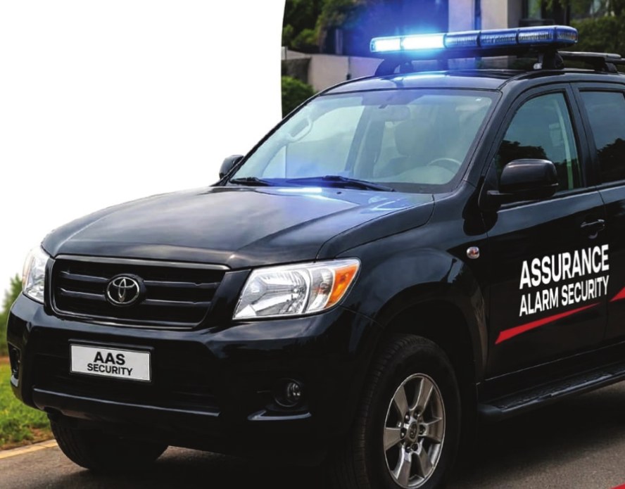 Assurance Alarm Security patrol vehicle with lights on