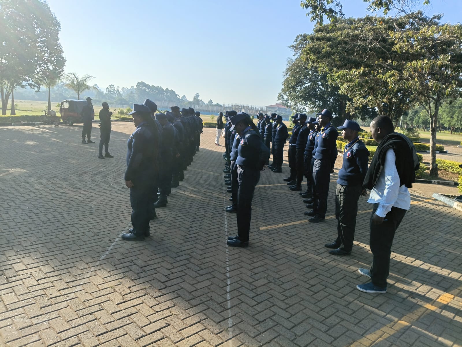 Supervisor conducting a morning inspection of guards